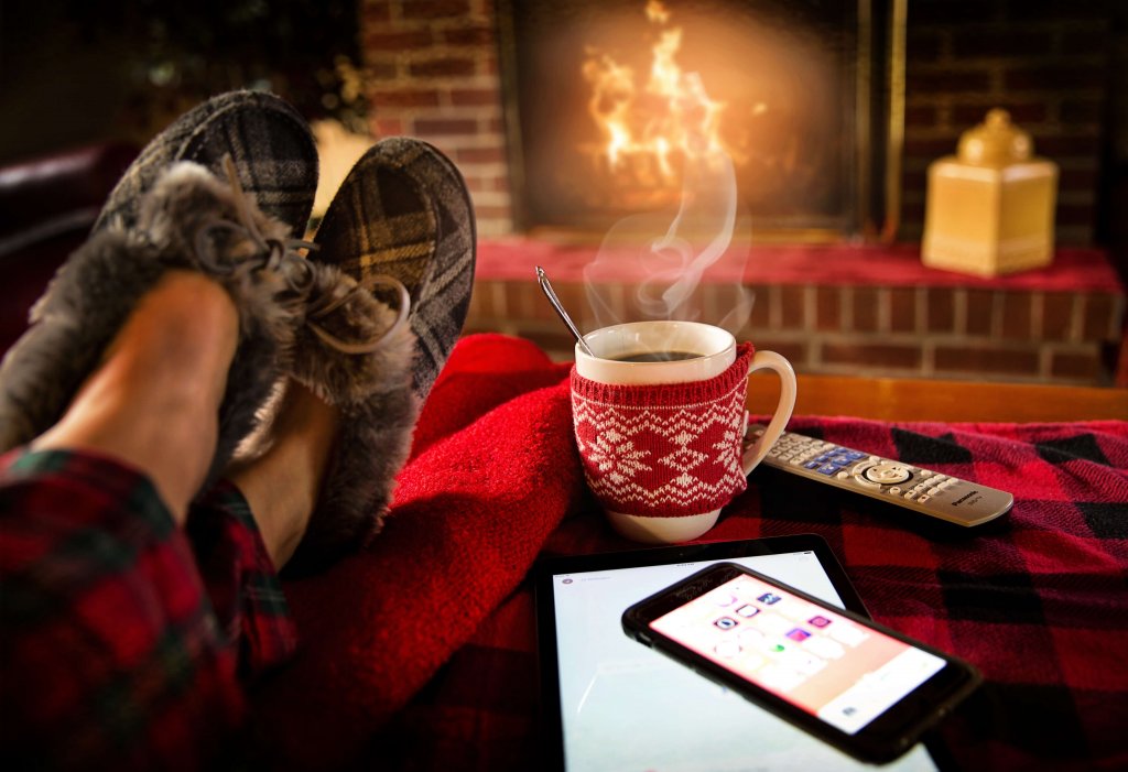 a cup of coffee and a fireplace