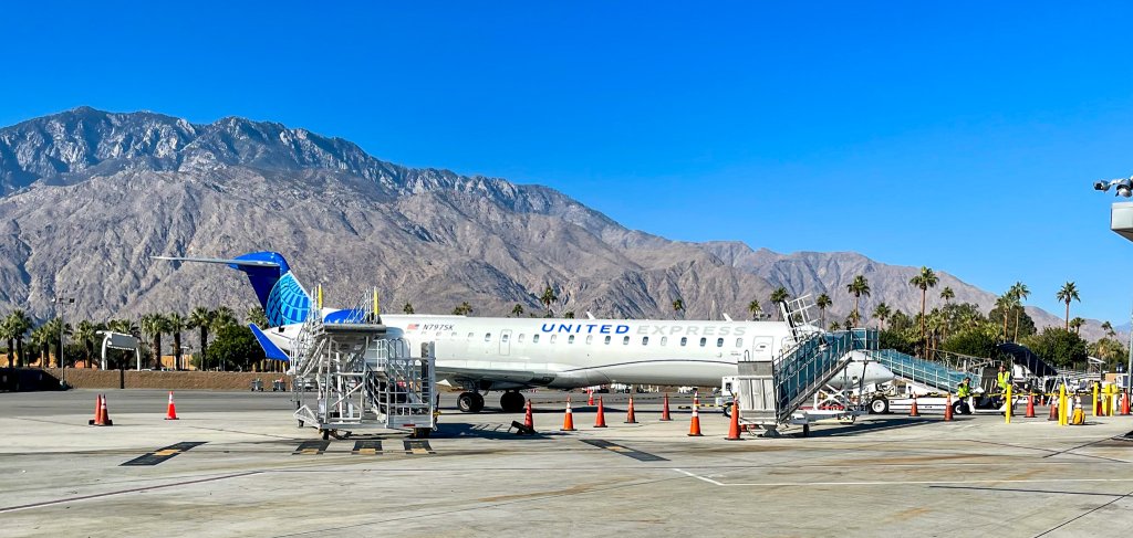 a picture of a United airplane sitting on the tarmac in Palm Springs