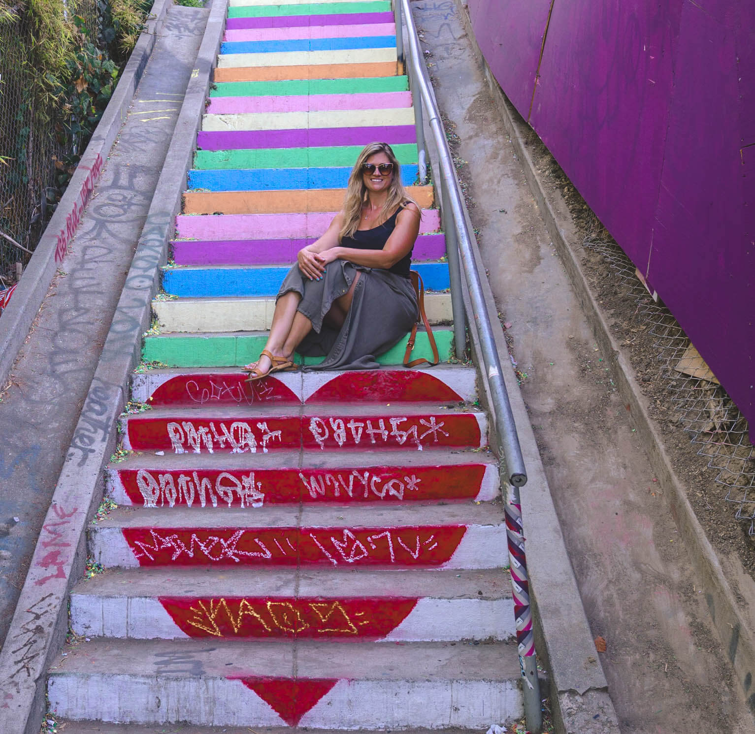 a women sitting on stairs