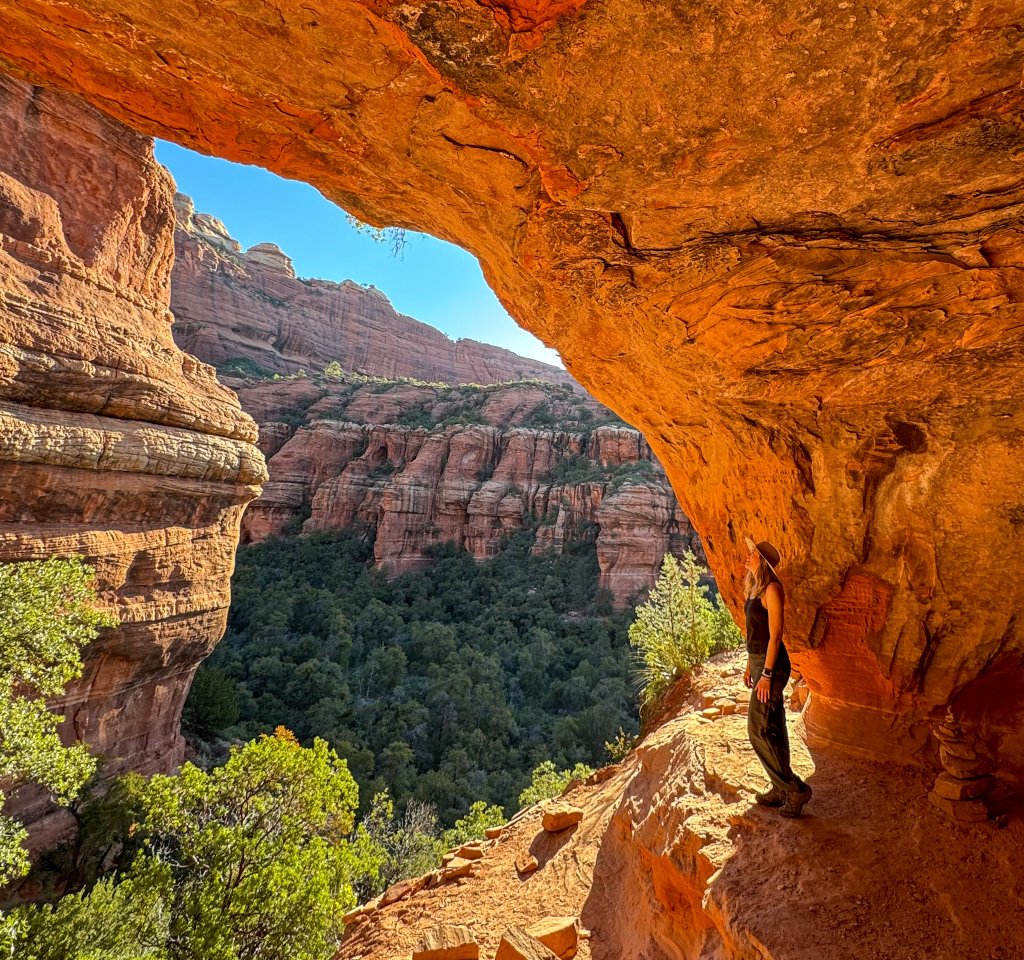 a women standing in a cave