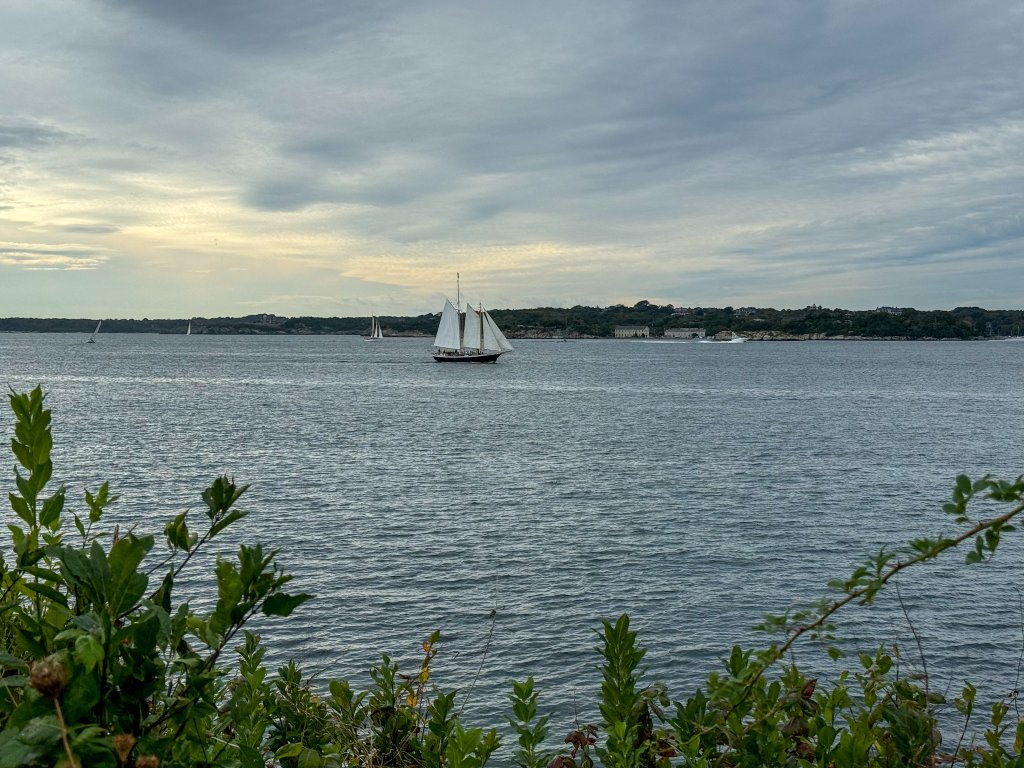 a sailboat in the water at Fort Adams State Park in Newport Rhode Island